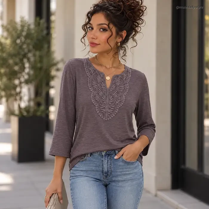 Mauve crochet-trim notch-neck top with three-quarter sleeves worn with jeans